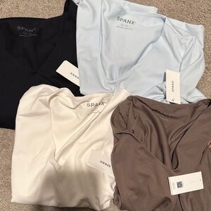 SPANX V-Neck Tops in Black, White, Light Blue, and Brown